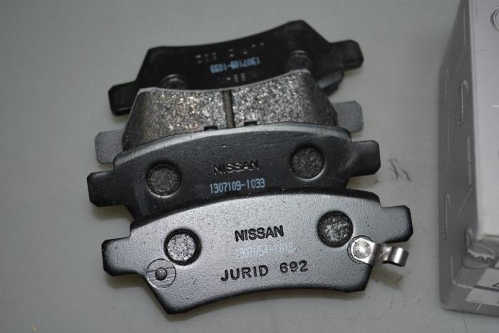 NISSAN 44060-EB325 - Brake Pad Set, disc brake autospares.lv